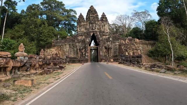 Old gate and temple in a tropical jungle landscape