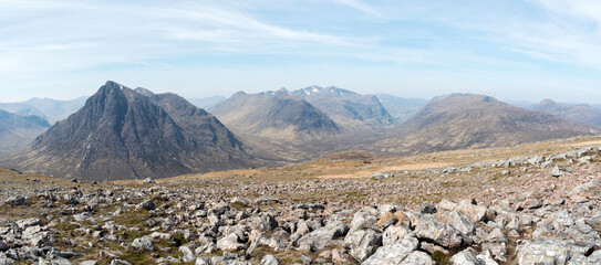 Glencoe, Scottish Highlands. Panoramic view including Buachaille Etive Mor, Buachaille Etive Beag, Bidean nam Bian and the Three Sisters, and the Aonach Eagach ridge. © David