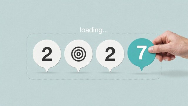 Human hand placing a turquoise number seven token into a digital loading sequence for year two thousand twenty seven