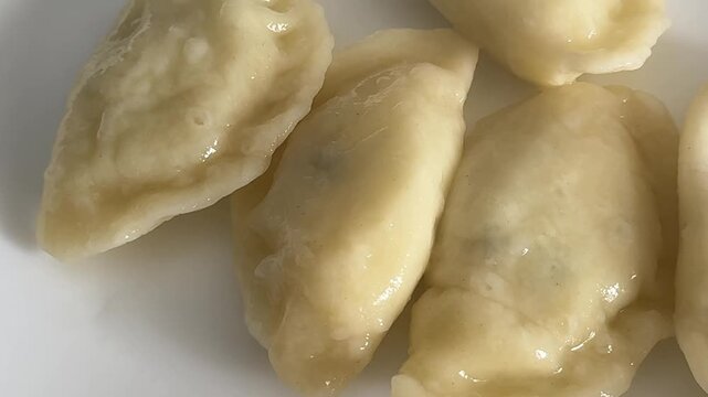 Vareniki stuffed dumplings ravioli serving size natural ingredients healthy eating, wholesome tasty dish, tasty snack fresh, gourmet, rustic food background on the table top view copy space