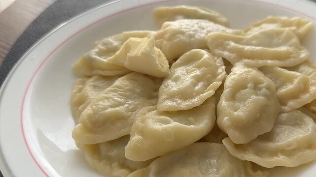 Vareniki stuffed dumplings ravioli serving size natural ingredients healthy eating, wholesome tasty dish, tasty snack fresh, gourmet, rustic food background on the table top view copy space