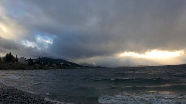 Windy Sunset Over Lake Nahuel Huapi In Bariloche Argentina With Birds