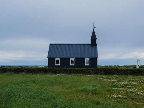 Historic black wooden church in Iceland