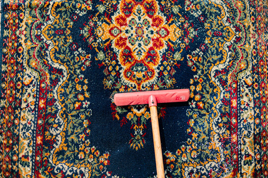 Authentic Patterned Rug and Cleaning Brush
