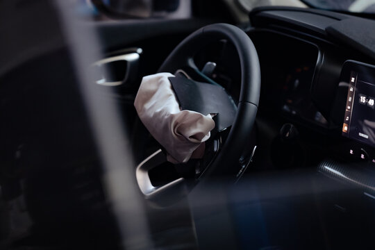 Deployed Airbag in Car