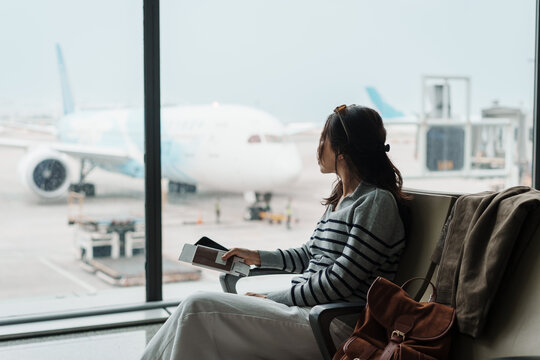 Female tourist was annoyed at having to wait for her delayed flight at the airport
