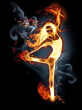 Dynamic fiery silhouette of a dancing figure in a graceful pose with vibrant flames and smoke on black background