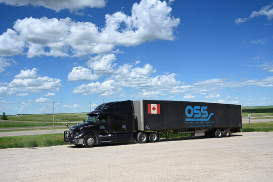 Tompkins, SK, Canada - July 04, 2026: Truck parked nearby Trans-Canada Highway 1 in Saskatchewan.
