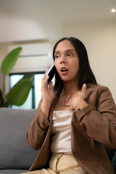 Young woman having an important private conversation