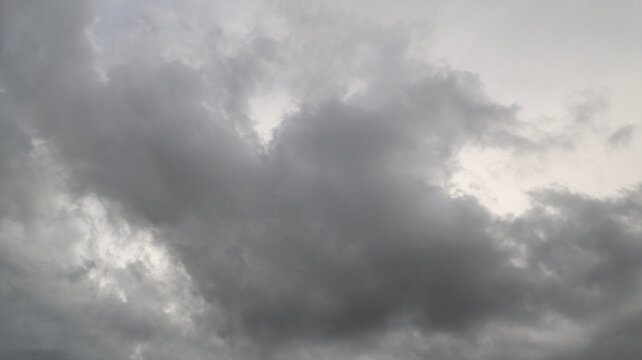 A grey storm clouds accumulating in the sky