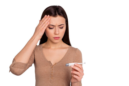 Portrait of disappointed lady youth touch hand forehead check temperature she her cant believe sad upset dressed modern clothing isolated grey background