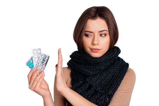 Portrait of minded pensive lady hold hand unaware need medical inflammation allergy antibiotics wear beige clothes youth isolated grey background