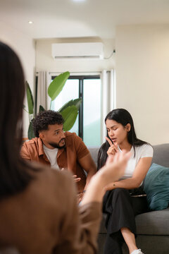 Couple discussing relationship problems during therapy session