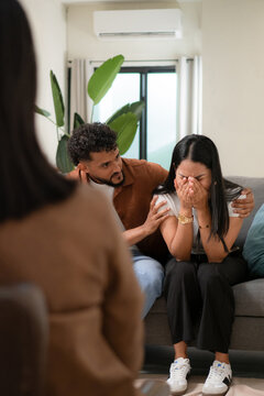 Couple receiving support during a therapy session