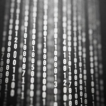 black white photograph series binary code lines lines arranged vertical pattern line slightly overlapping one below numbers white appear floating air background blurred making lines focal point taken