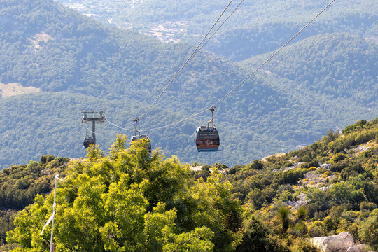 Beautiful landscape with a funicular railway and wooded mountains (Mount Babadağ, Oludeniz, T&uuml;rkiye)