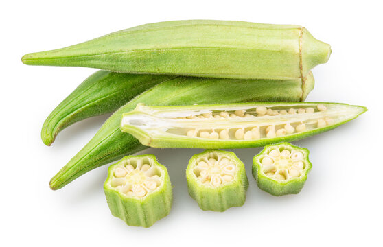  Fresh okra vegetable with sliced raw green okra pieces revealin