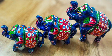 colorful toy elephant family.  © 3RdEYE Photo Co.
