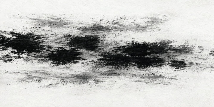 Abstract monochrome painting with dark ink splatters on textured paper