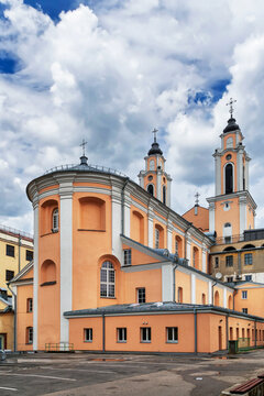 Apse view of the Church of St. Francis Xavier in Kaunas, Lithuania. Baroque architecture under a partly cloudy sky