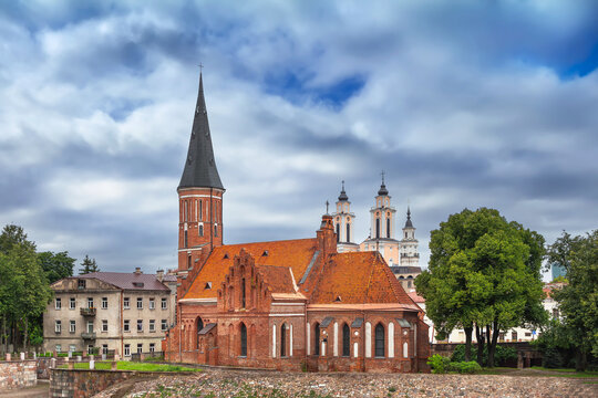 Side view of Church of Vytautas the Great with Church of St. Francis Xavier behind in Kaunas, Lithuania. Gothic and baroque