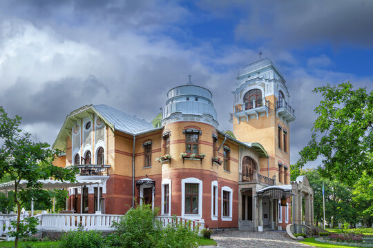 Facade of the Ammende Villa in Parnu, Estonia. Art Nouveau luxury hotel architecture under a partly cloudy sky