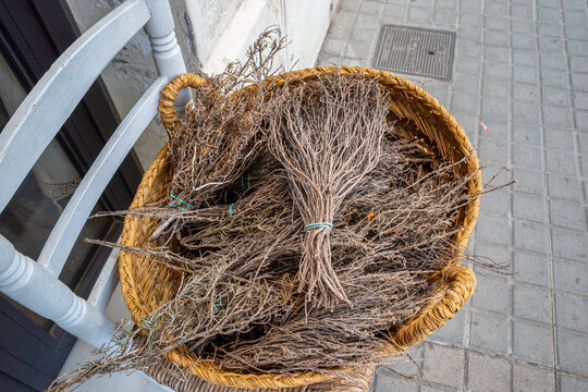Dried herbs bundle in a woven esparto basket