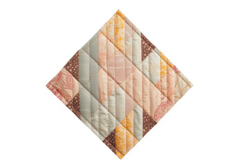 Obraz premium Handmade quilted patchwork with various fabric patterns in a diamond shape