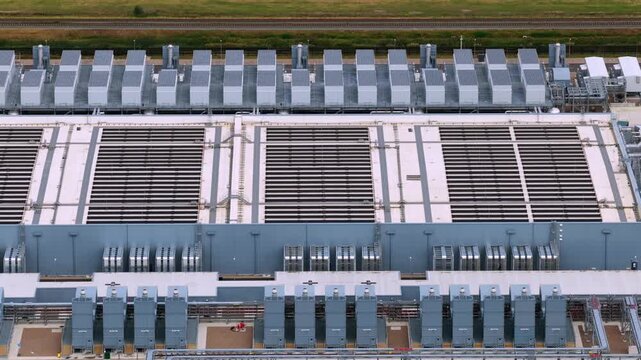 Aerial view of the Google Data Center roof featuring rows of cooling units and industrial infrastructure in Groningen, Groningen, Netherlands.