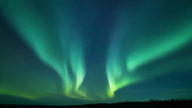 Vibrant Green Aurora Borealis Dancing in the Night Sky