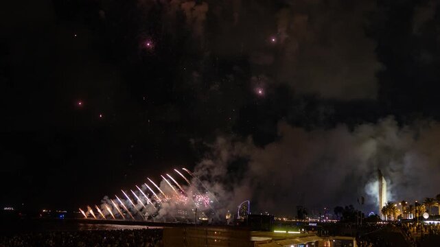Amazing fireworks display over the coast of barcelona