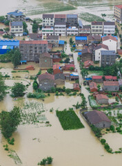 Aerial View of Flooded Village and Farmland in Xiangzhou District © PhamThi