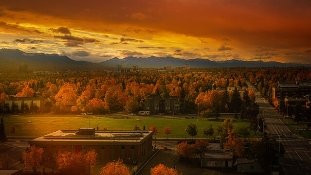 Anchorage downtown autumn skyline at sunrise with dramatic cloudscape in United States.