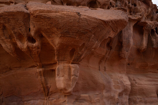 Abstract Sandstone Rock Formation with Deep Erosion Patterns