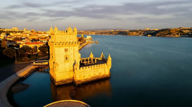 aerial drone view of bel&eacute;m tower in lisbon portugal at golden-hour timelapse video