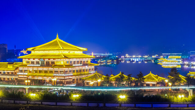 Night view of traditional Chinese architecture at Qujiang Pool, Xi'an
