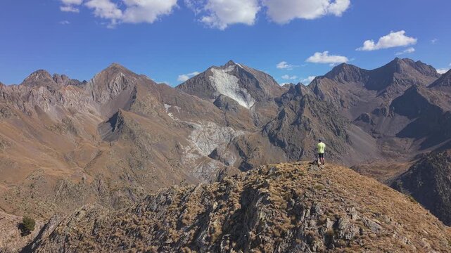 Lateral Drone Reveal from Puy Arcol Summit Across Pyrenean Peaks