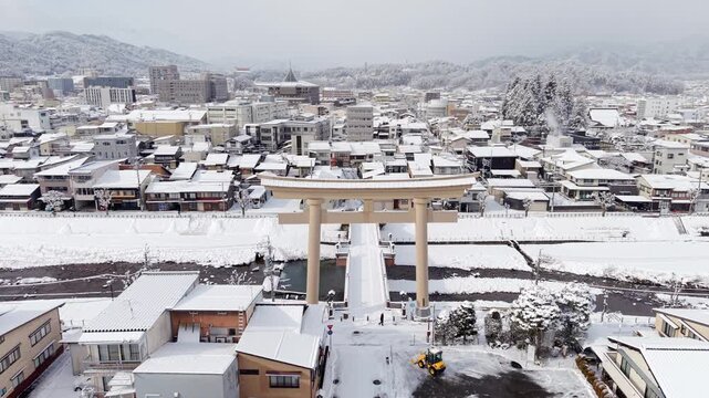 Aerial view of Takayama blanketed in snow during winter in the Hida region, Gifu, Japan.