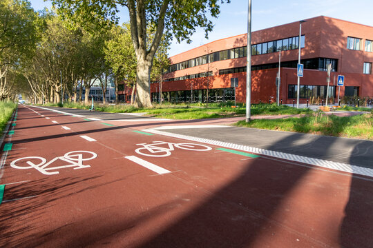 Reopening of Luisengymnasium in Dusseldorf, North Rhine Westphalia shows bicycle lane for pupil bikers modern school building for state of the art education equipment for students, pupils and teachers