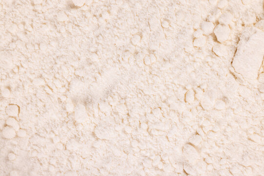 White flour powder creating abstract food ingredient texture