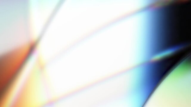Modern futuristic abstract motion graphic of vibrant chromatic aberration and prismatic light refractions. holographic lens flare and soft colorful gradient light transitions. 4k.