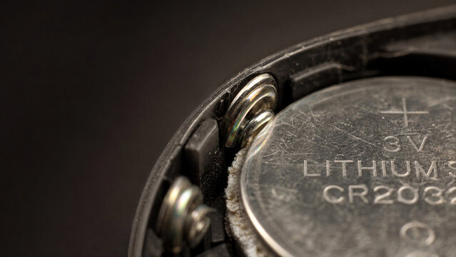 Hardware Token Battery Compartment Contact Springs Corrosion Macro Security Background