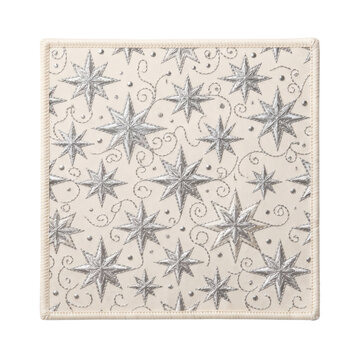 Cream linen fabric swatch with silver embroidered Christmas stars