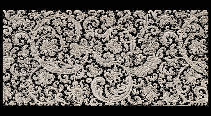 Ornate white lace texture with floral pattern on black background © Ana