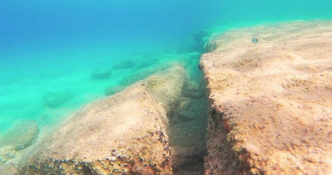 Underwater Volcanic Tectonic Rock Formations on Seabed
