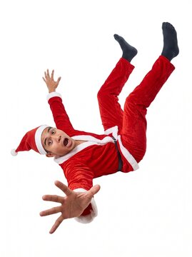 Man in Santa costume falling backward, with shocked expression