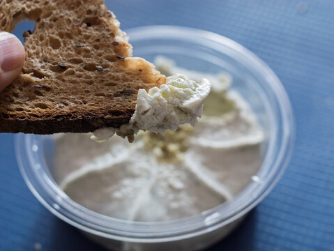 Antipasti Cream with Garlic on Black Bread