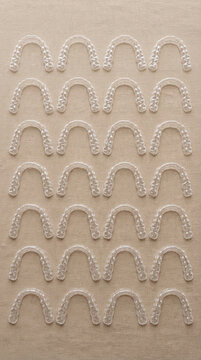 Invisible Dental Aligners Arranged in Rows