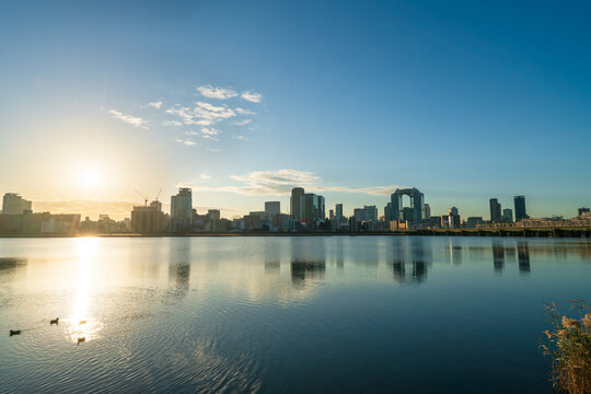 Beautiful sunrise view of Osaka city skyline. Japan 