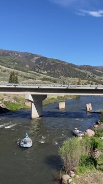Vertical View Of Anglers Floating Down Rio Grande River In Colorado Near Creede